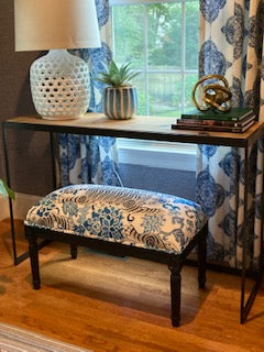 Bench upholstered with blue tiger fabric