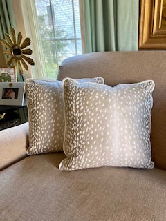 Antelope pillow with white velvet piping